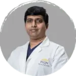 Dr Anand M